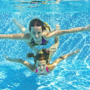 image of two girls swimming