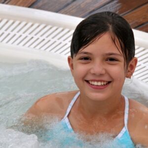 image of a young girl in a hot tub