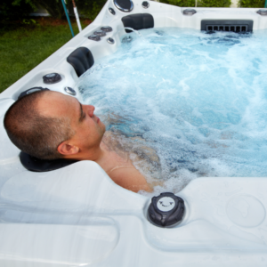 man relaxing in hot tub