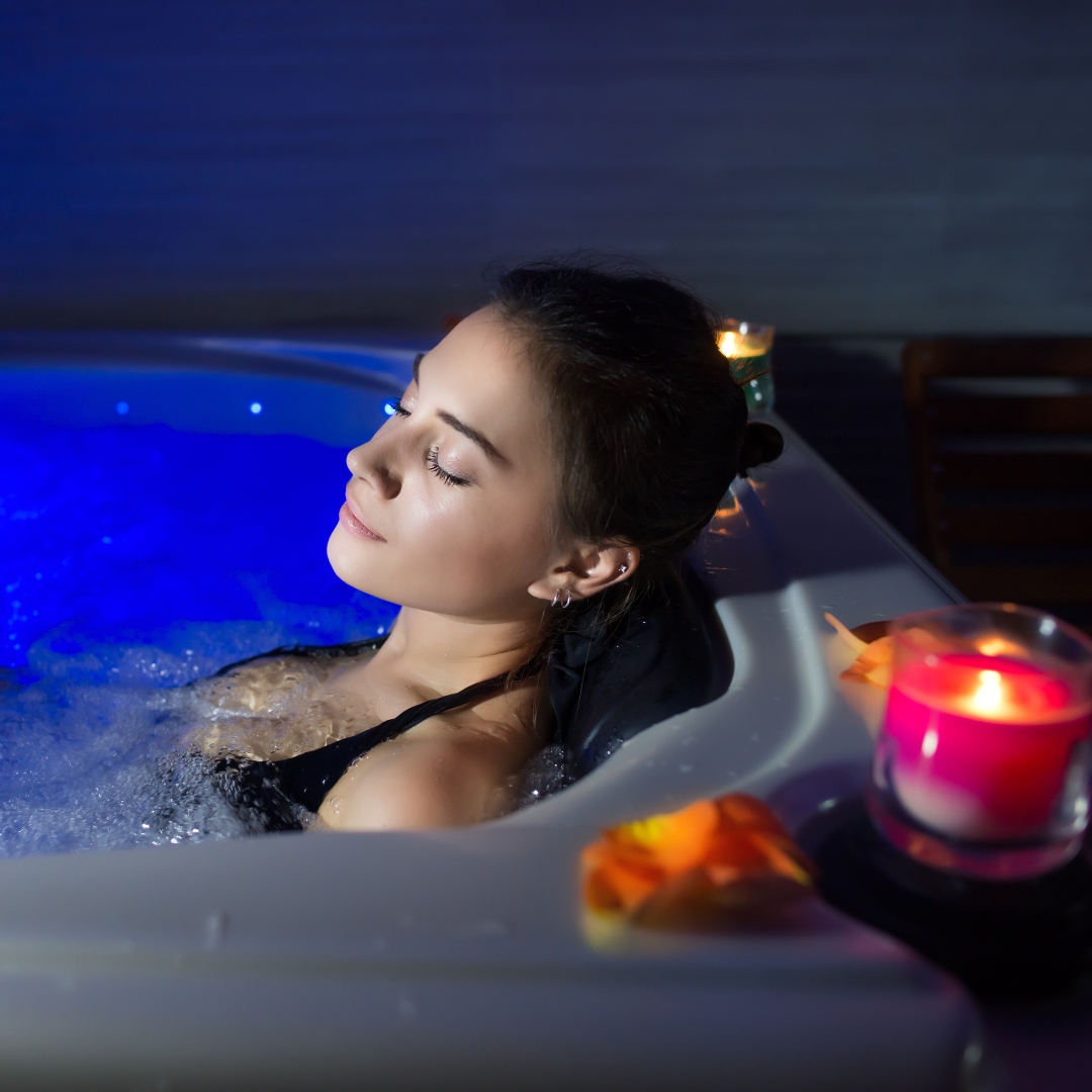 woman relaxing in hot tub